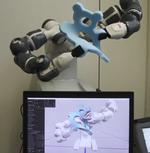 Interactive robotic manipulation of elastic objects