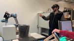 Spatial computing and intuitive interaction: Bringing mixed reality and robotics together